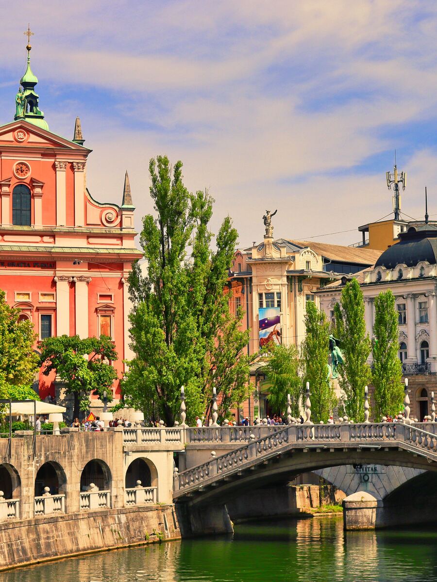 The Ljubljanica riverfront with the Triple Bridge and the Franciscan Church